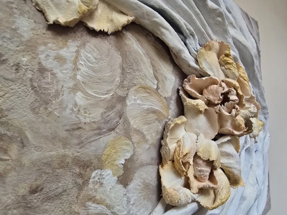 Floral and folds relief panel