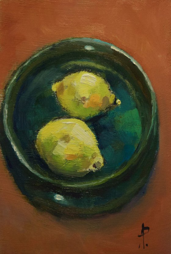 Two Lemons in Green Bowl
