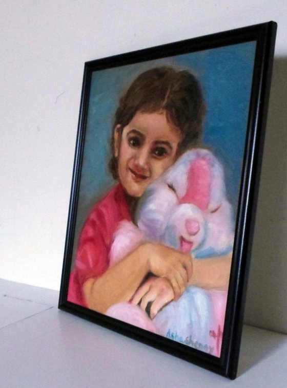 Little girl with a teddy