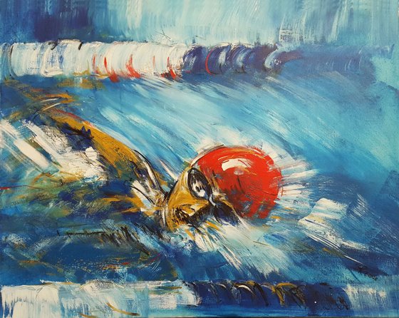 Swimming man with red bathing cap