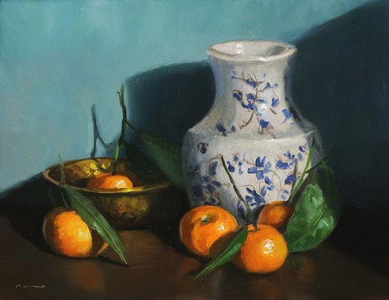 Clementines and a Vase