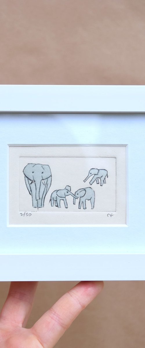 Small framed elephant and three young by Sally Fisher