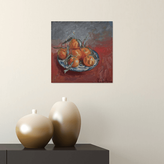 Still life with fruits "Tangerines on red"