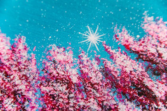 Pink sakura blossoms at night