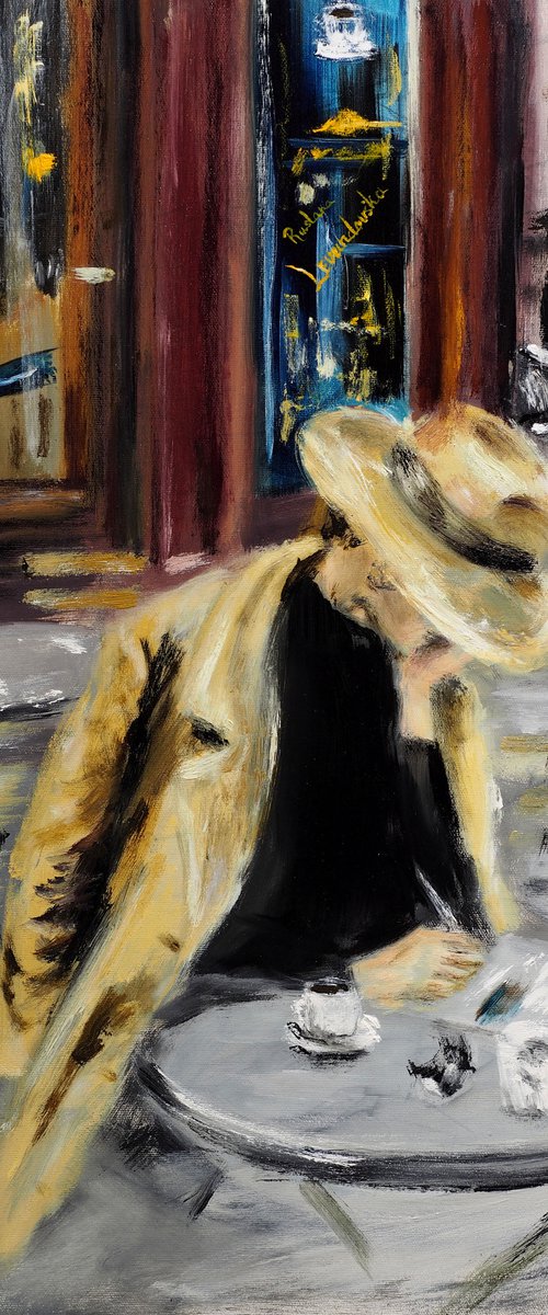 Woman at a Paris Cafe by Ruslana Levandovska