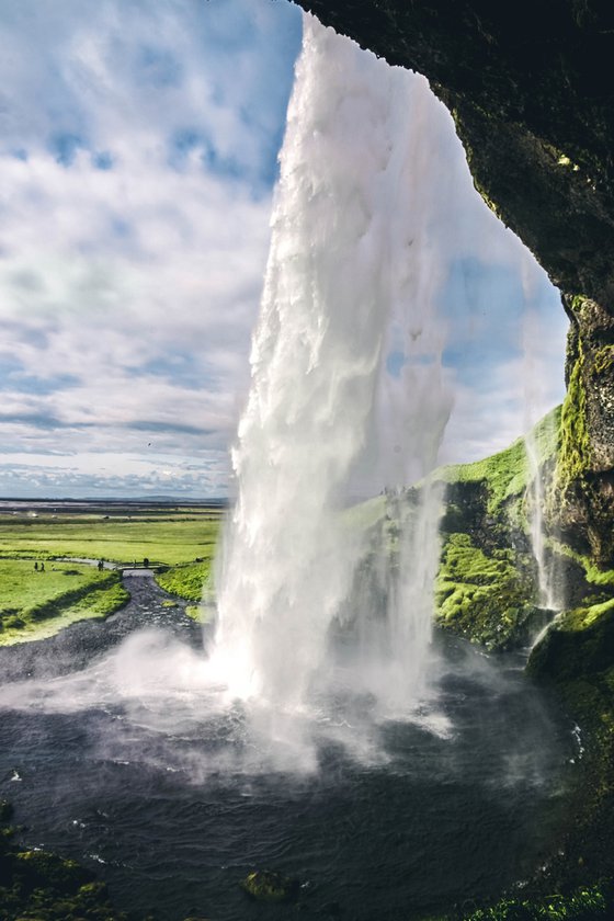 BEHIND THE WATERFALL