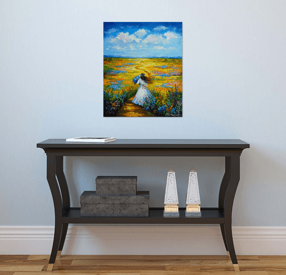 Woman Walking Through a Flower Field