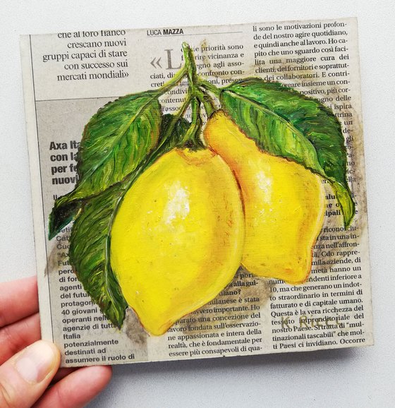 "Leafy Lemons on Newspaper"