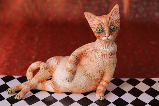 Red Fury Resting. Ceramic cat sculpture.
