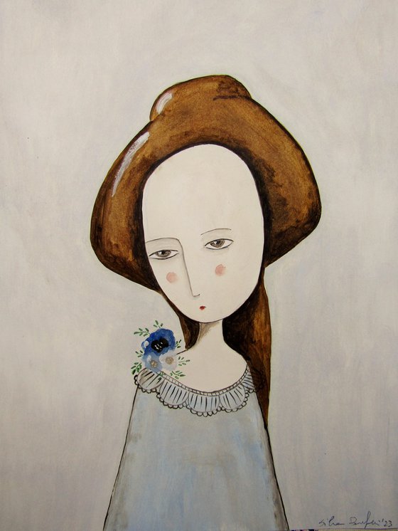 The woman with flowers on her shoulder