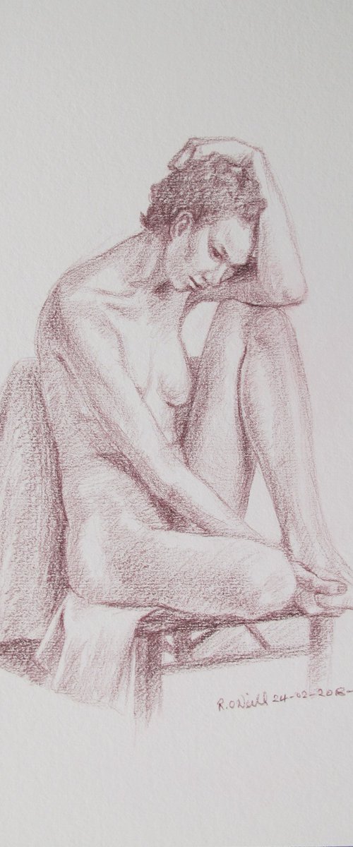 Seated female nude by Rory O’Neill