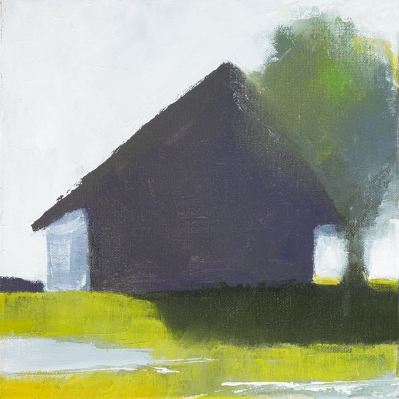 Lonely barn on green grass