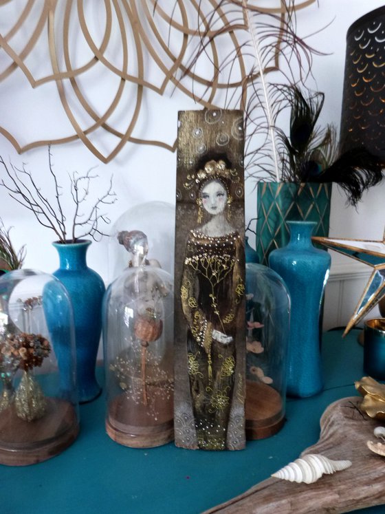 Painting on wooden stave, woman in gold and brown, Gold Umbel.