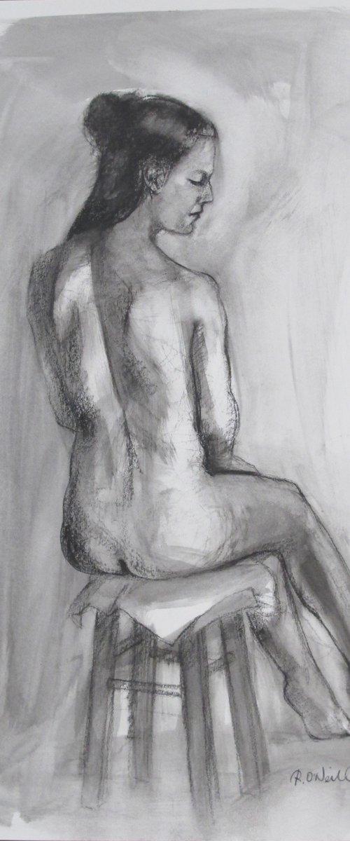 Seated female nude by Rory O’Neill