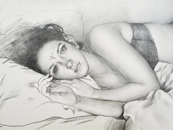 Woman Lying on a Bed