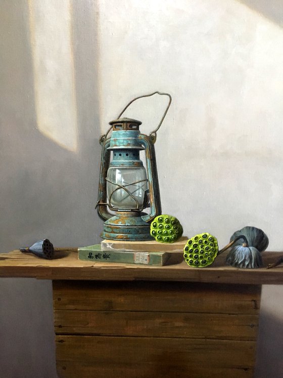 Still life zen art:kerosene lamp with lotus seedpod