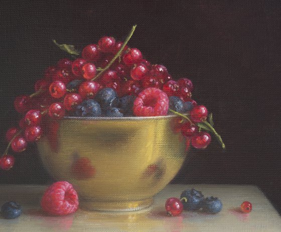 Berries in a golden bowl