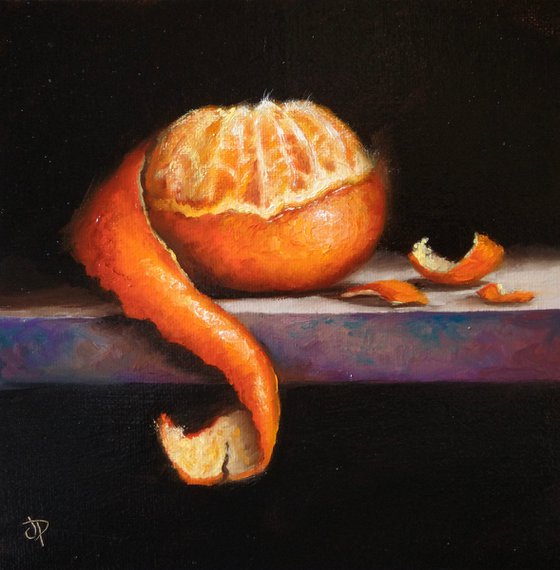 Peeling clementine still life