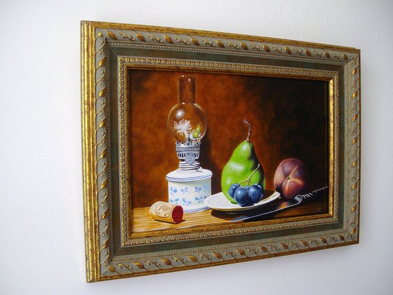 Oil lamp with fruits