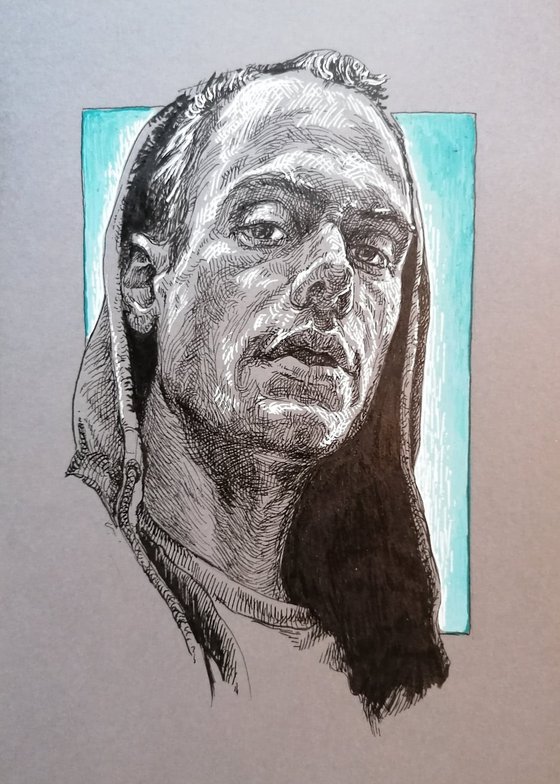 Hooded man portrait. Portrait on paper