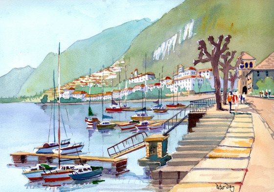 Tremezzo, Lake Como, Italy. Boats, Hills & people