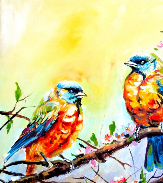 Birds with flowering branch