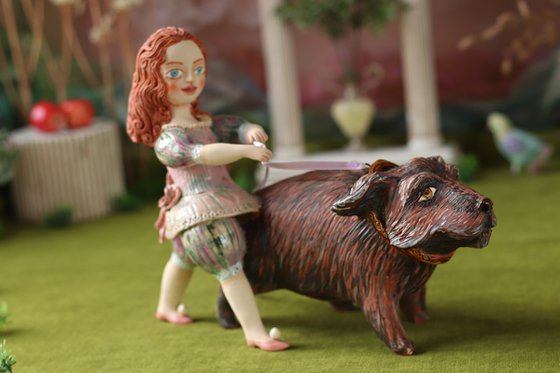 Girl Walking her Dog. Ceramic Sculpture by Elya Yalonetski