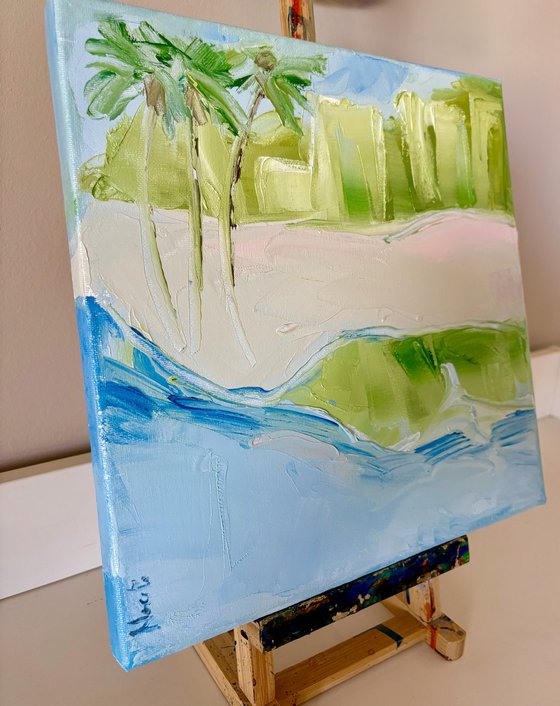 Soft blue ocean tropical beach