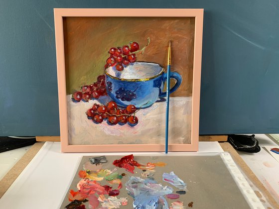 Tea Cup and red currants.