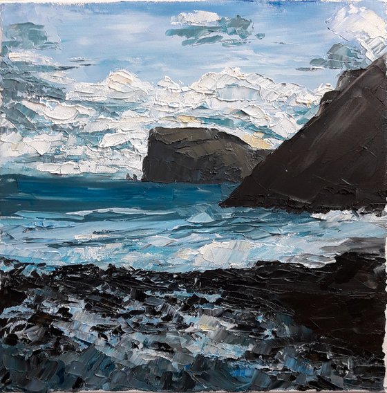 Blue sea, black rocks. Faroe