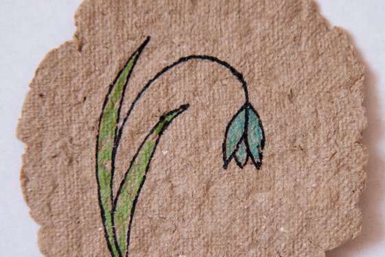 Snowdrop drawing on the author's craft paper