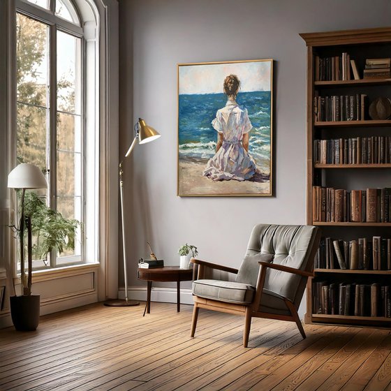 Woman by the ocean.