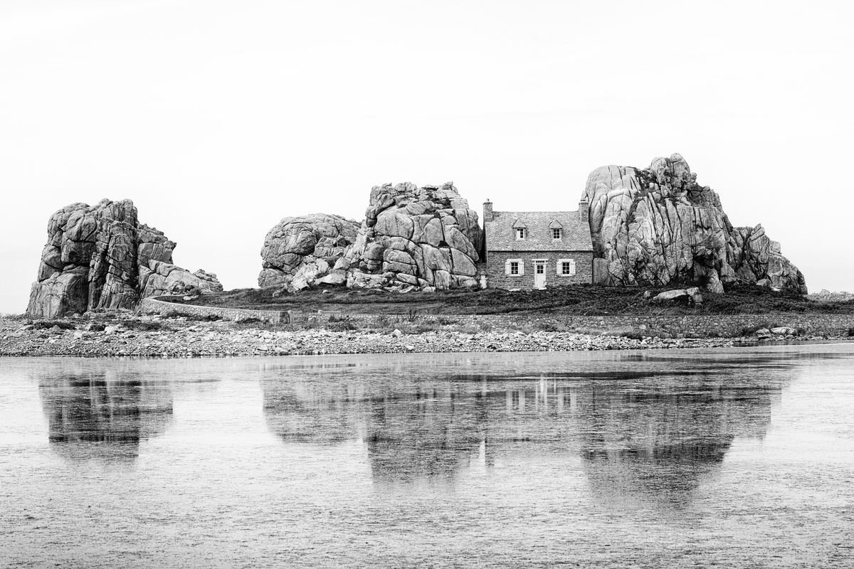 the house between the rocks by Christian Schwarz
