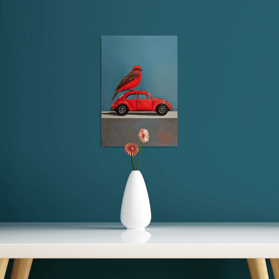 Still life with bird and old red car