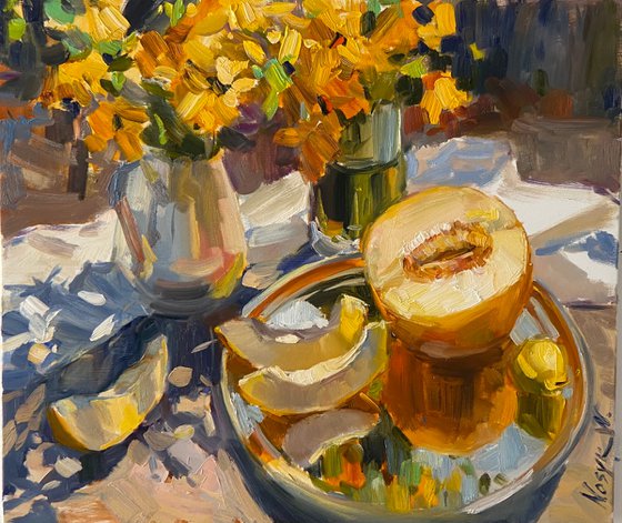 Melon on silver plate