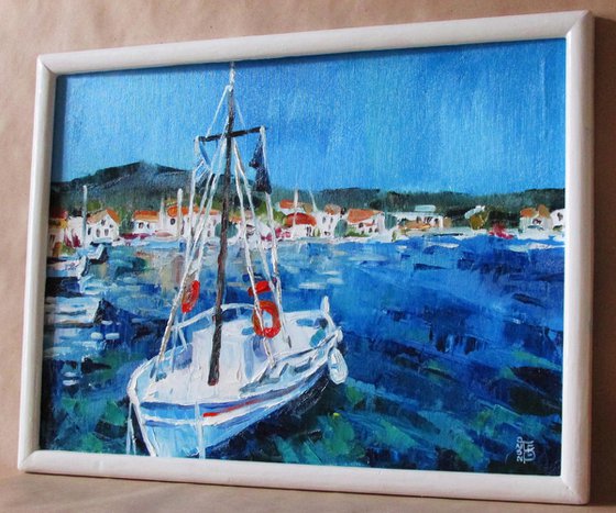 Boat in the harbor (framed)