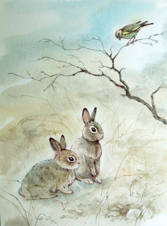 Two hares and a greenfinch