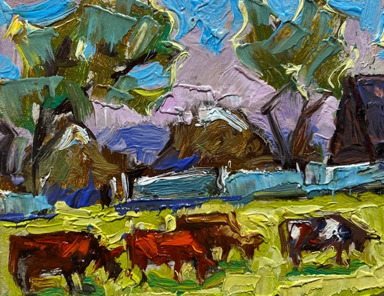 Cows on a green field