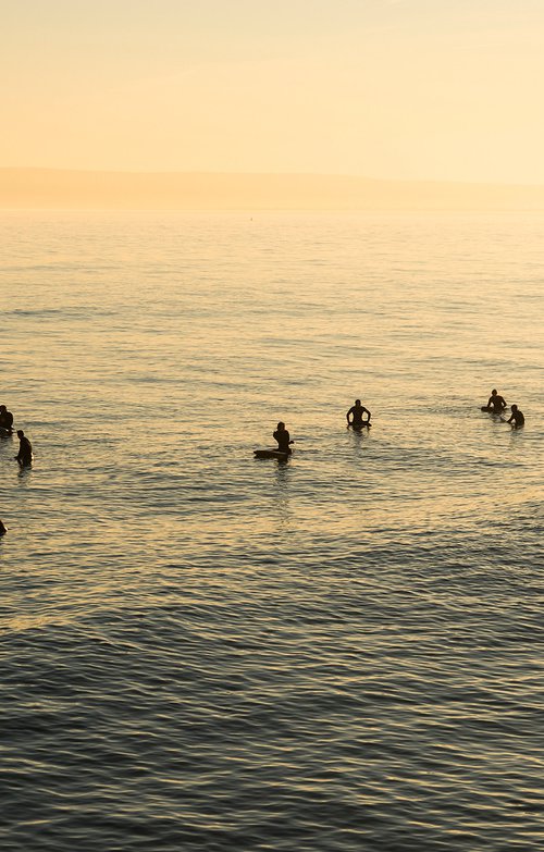 SUNSET SURFERS by Andrew Lever