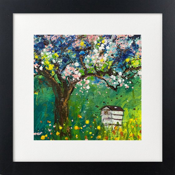 Beehive in orchard framed