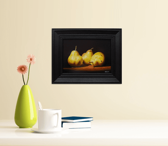 Three pears in chiaroscuro