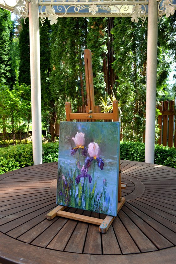 Three Irises by the pond