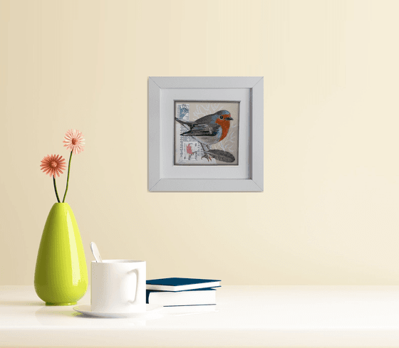 The Robin feather  (framed and ready to hang)