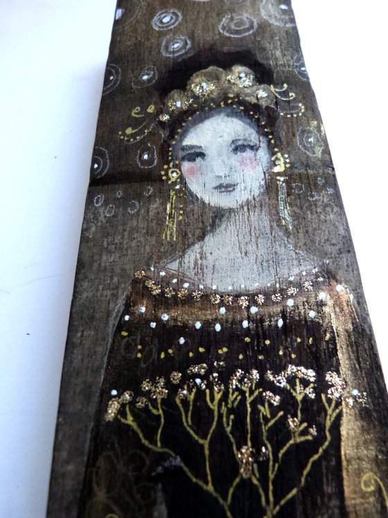 Painting on wooden stave, woman in gold and brown, Gold Umbel.