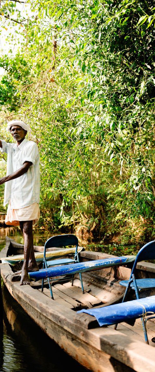 Boatman, Kerala Backwaters by Tom Hanslien