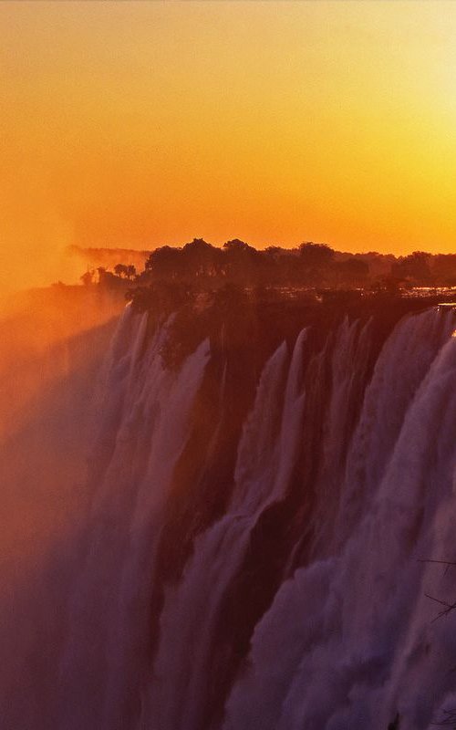 Sunset over the Victoria Falls by Alex Cassels