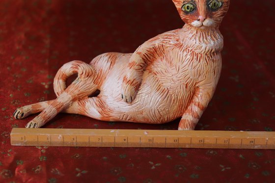 Red Fury Resting. Ceramic cat sculpture.