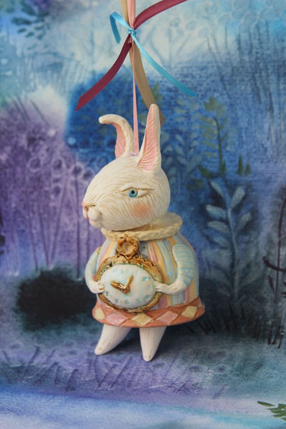 Little rabbit in harlequin dress. Hanging sculpture, bell doll by Elya Yalonetski