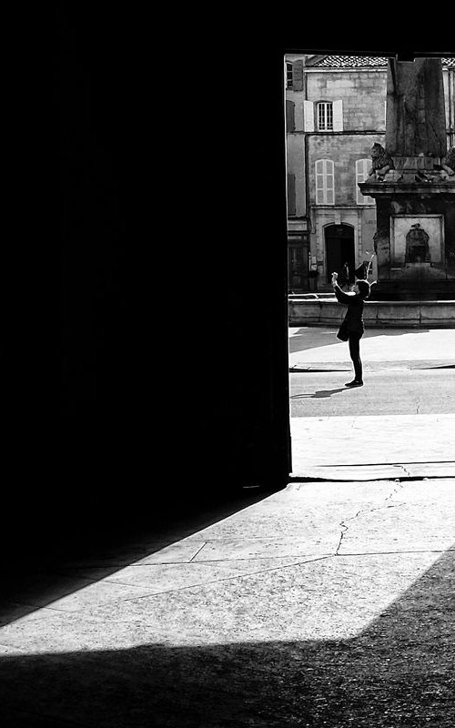 a photographer in Arles by Christian  Schwarz