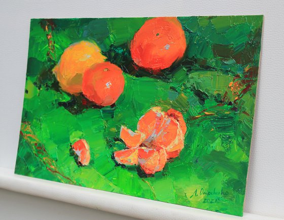 Tangerines on green